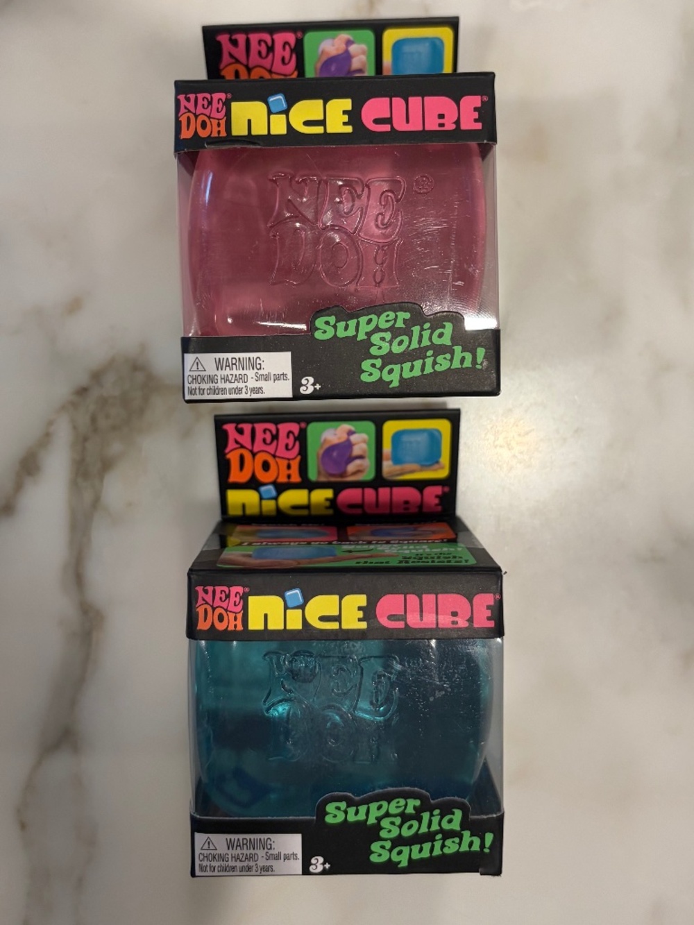 Two Needoh nice cubes pink and blue